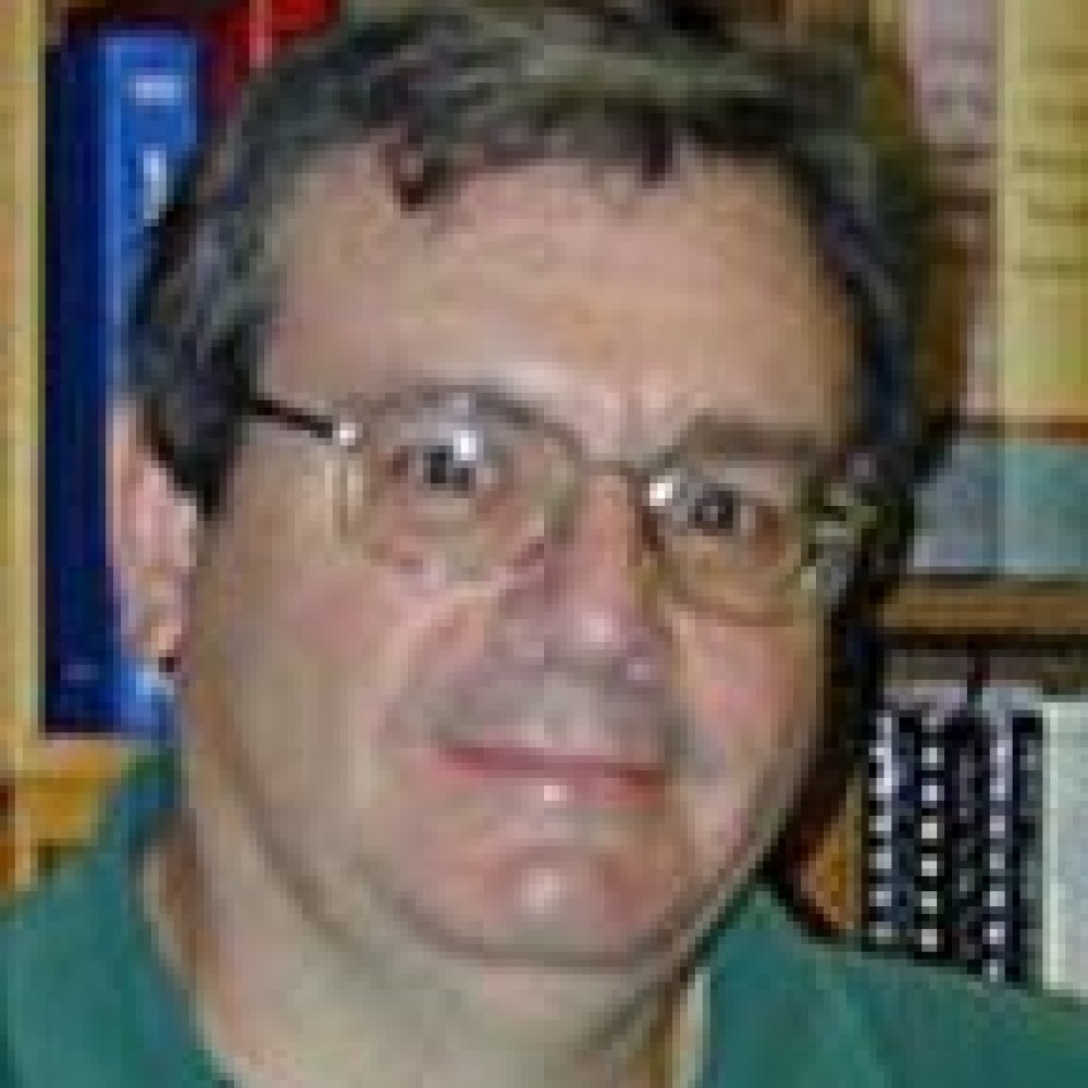 Person wearing glasses smiling