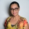 Person wearing glasses smiling