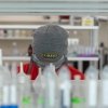 A student works with paper-based microfluidics during a class taught by associate professor of chemistry Daniel Scott.