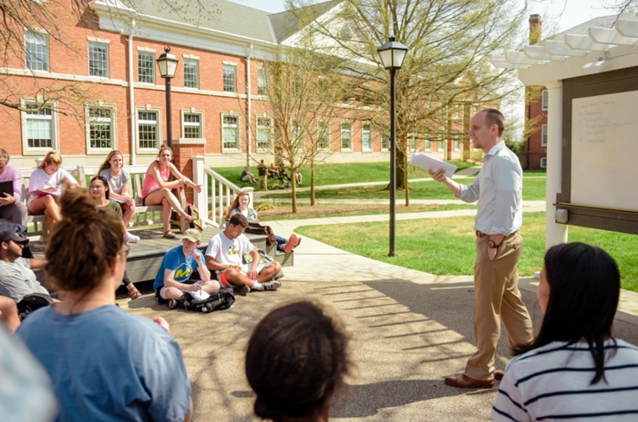 Professor teaching class in outdoor classroom