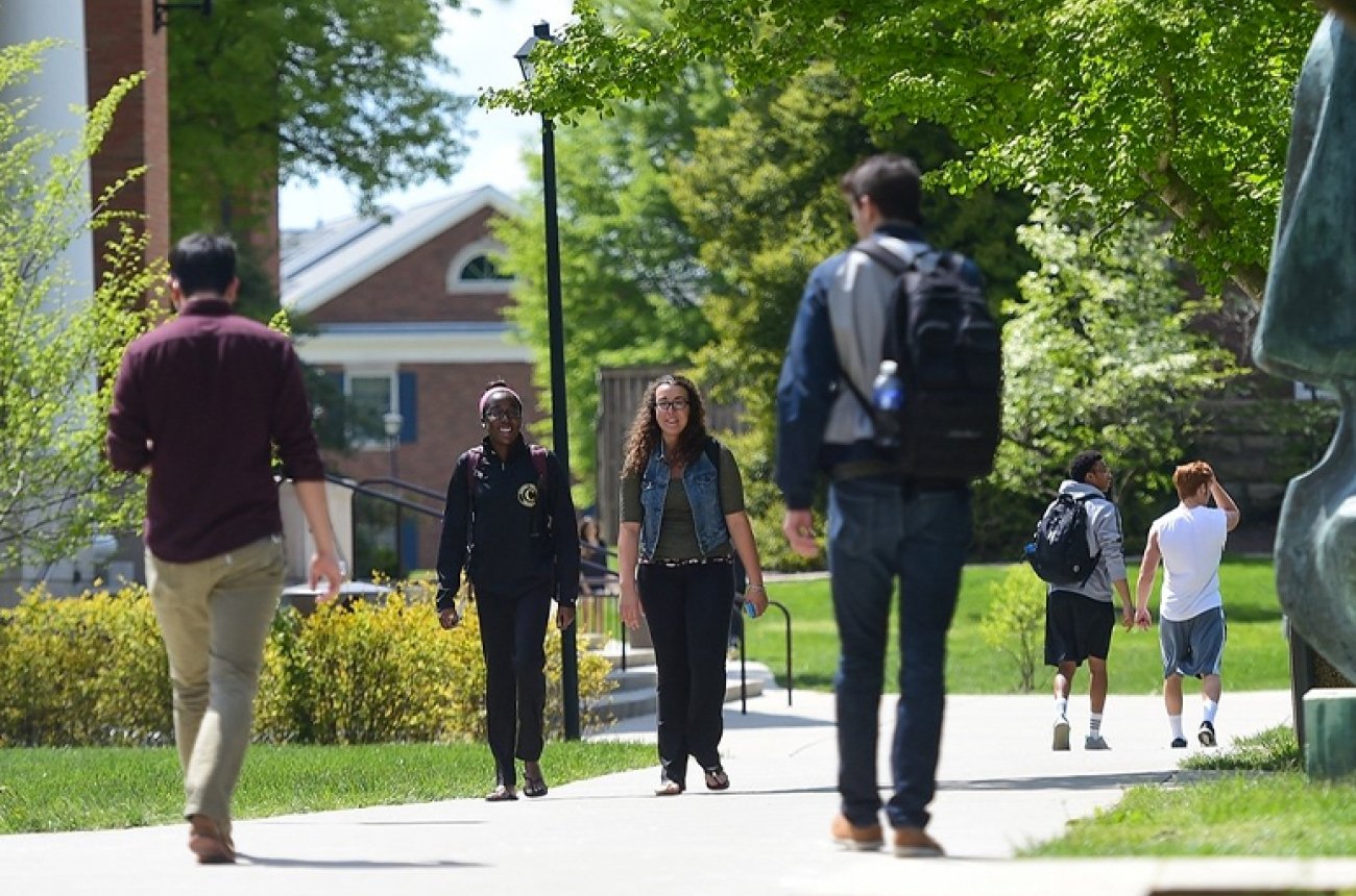 students walking across campus