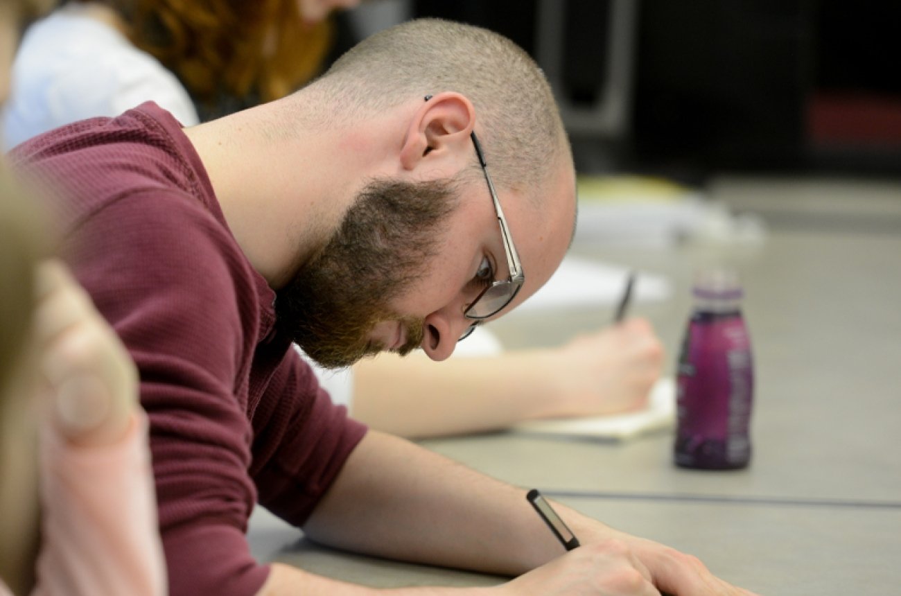 Student taking test in classroom