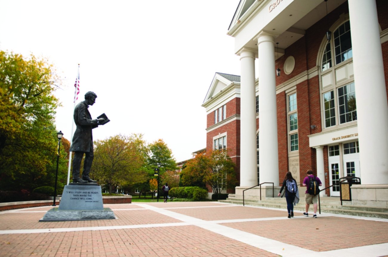 Students walking in front of the library