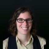 Person wearing glasses smiling