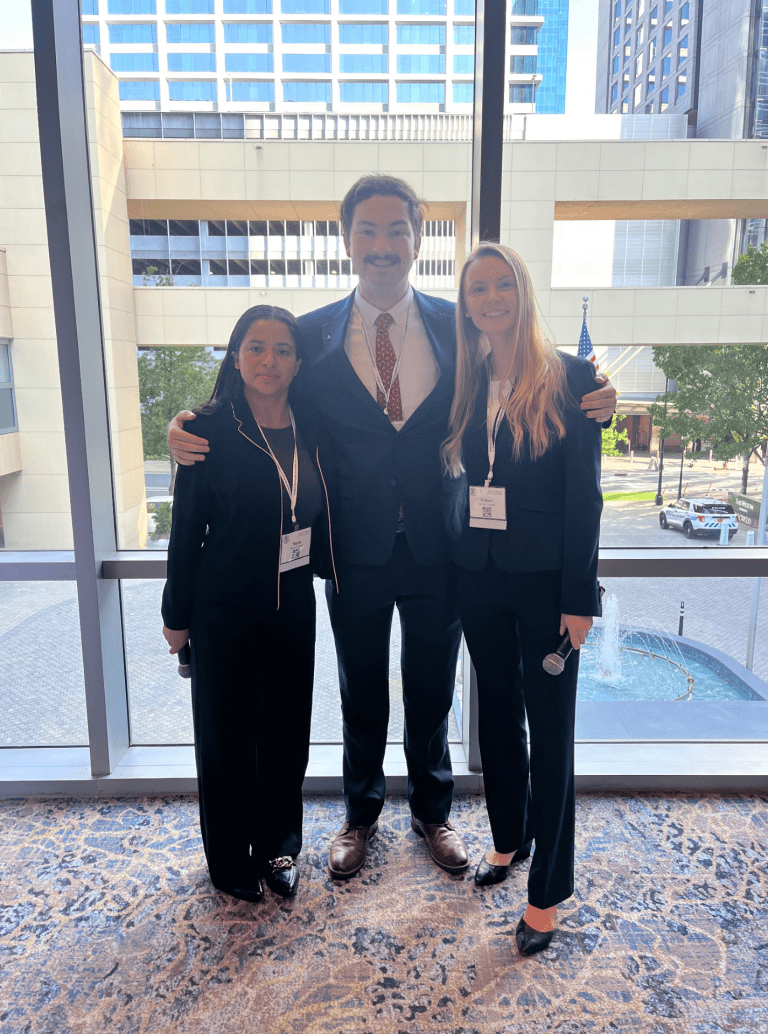 Maria Sanchez with two fellow interns