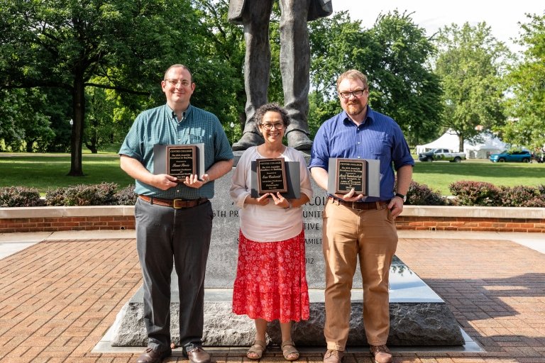 Kirk Teaching Award winners Sami Sweis, Eva Catavid and Mark Galatowitsch pose with their award plaques outside the Centre College Library.
